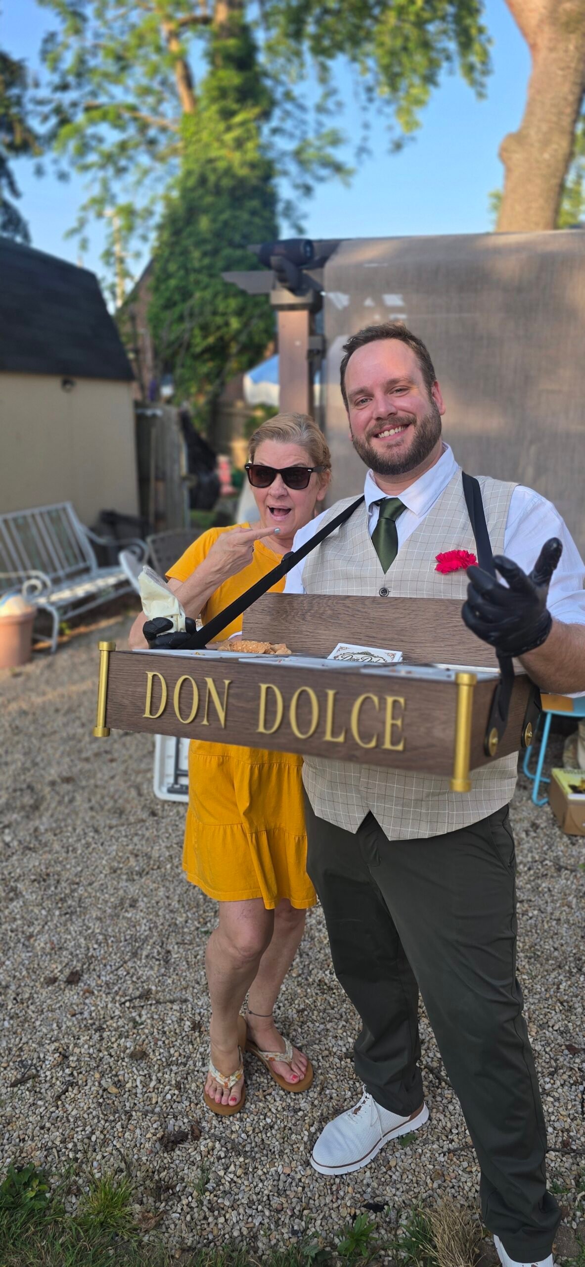 Don Dolce serving fresh-filled cannoli to a musical cast after their final performance in Middletown, Delaware