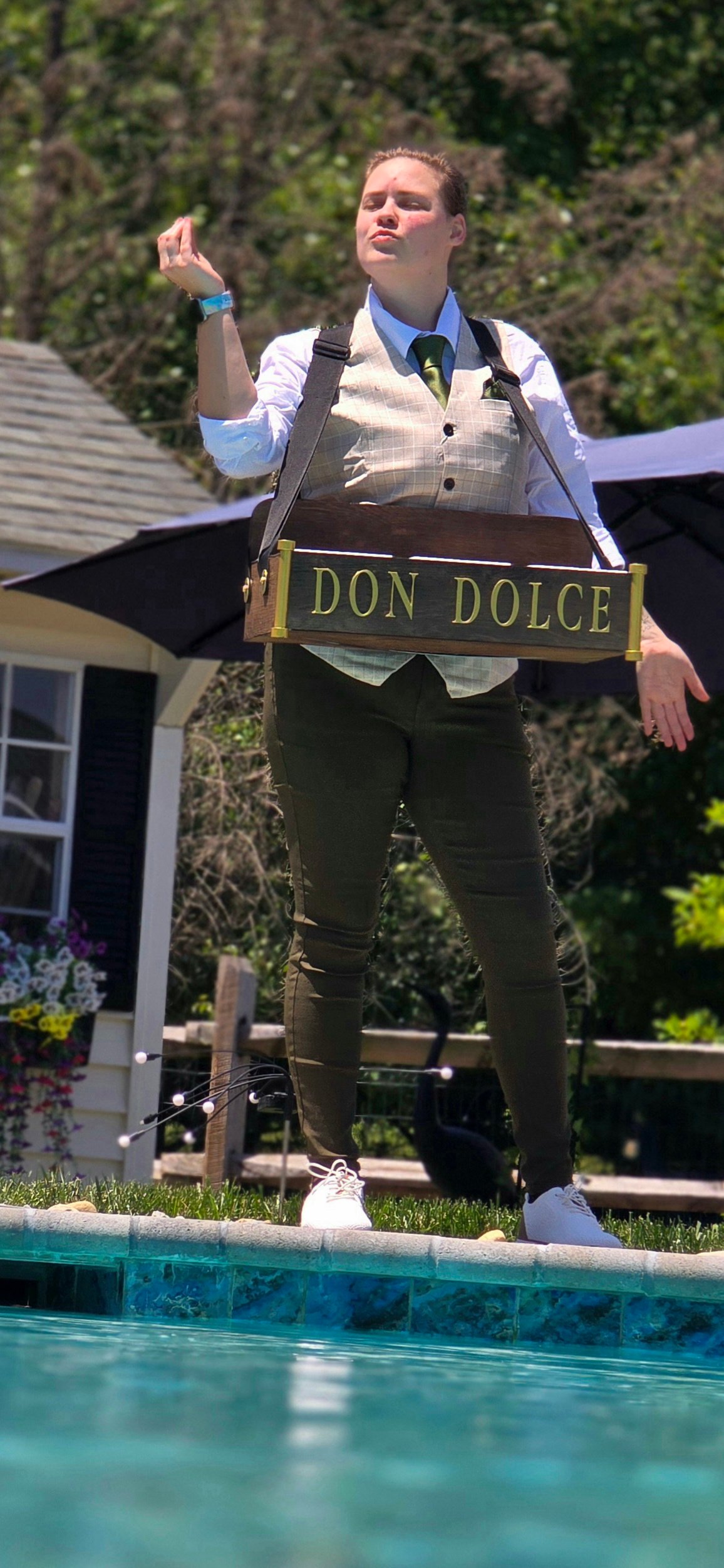 Don Dolce providing roaming fresh-filled cannoli service at a private club event