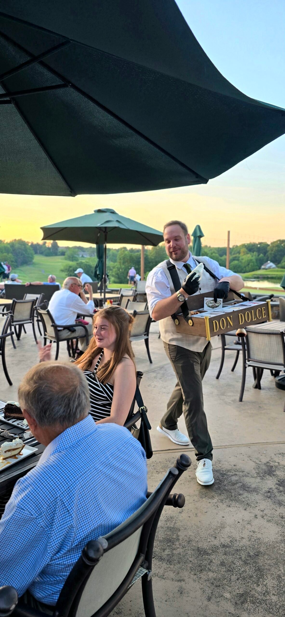 Don Dolce roaming cannoli catering at a Hartefeld National golf tournament in Avondale, Pennsylvania