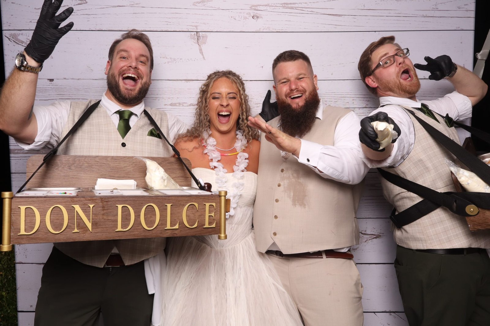 Don Dolce entertaining wedding guests with roaming cannoli catering at La Banque de Fleuve in Havre de Grace, Maryland.