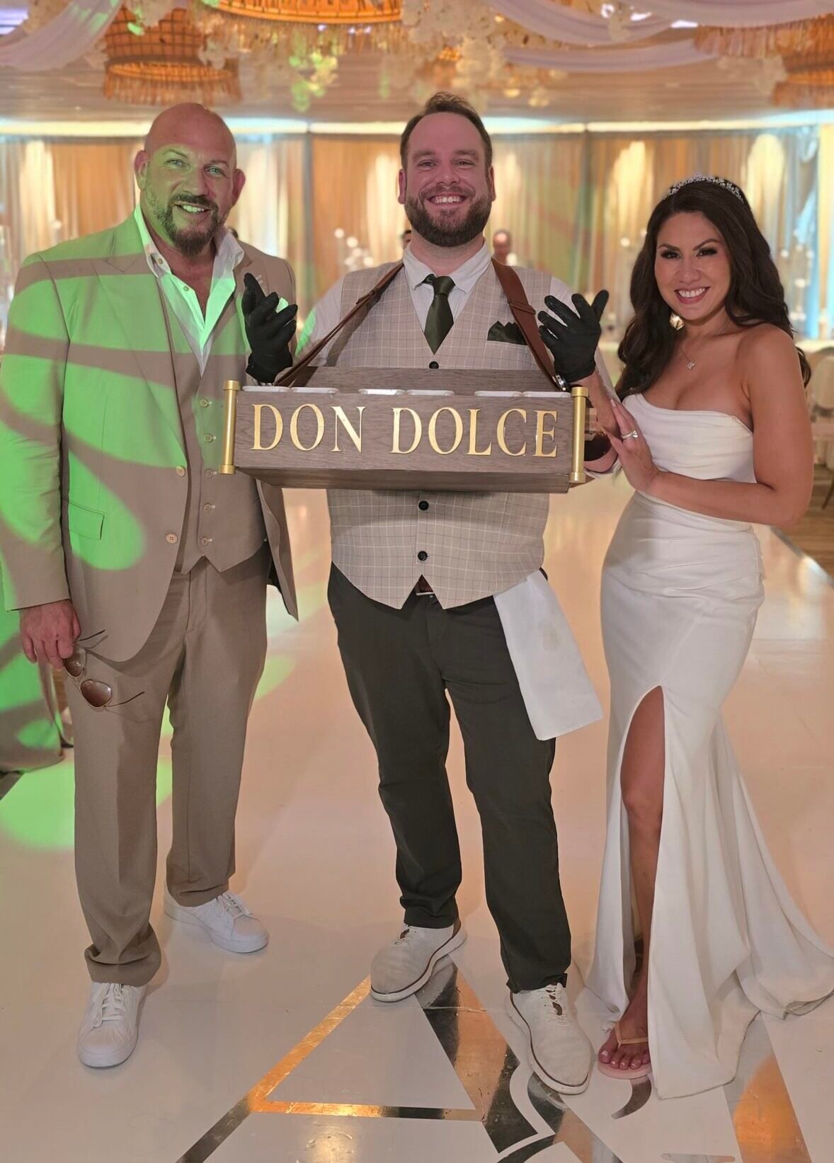 Don Dolce offering roaming cannoli catering alongside newlyweds at JW Marriott Marco Island, Florida.