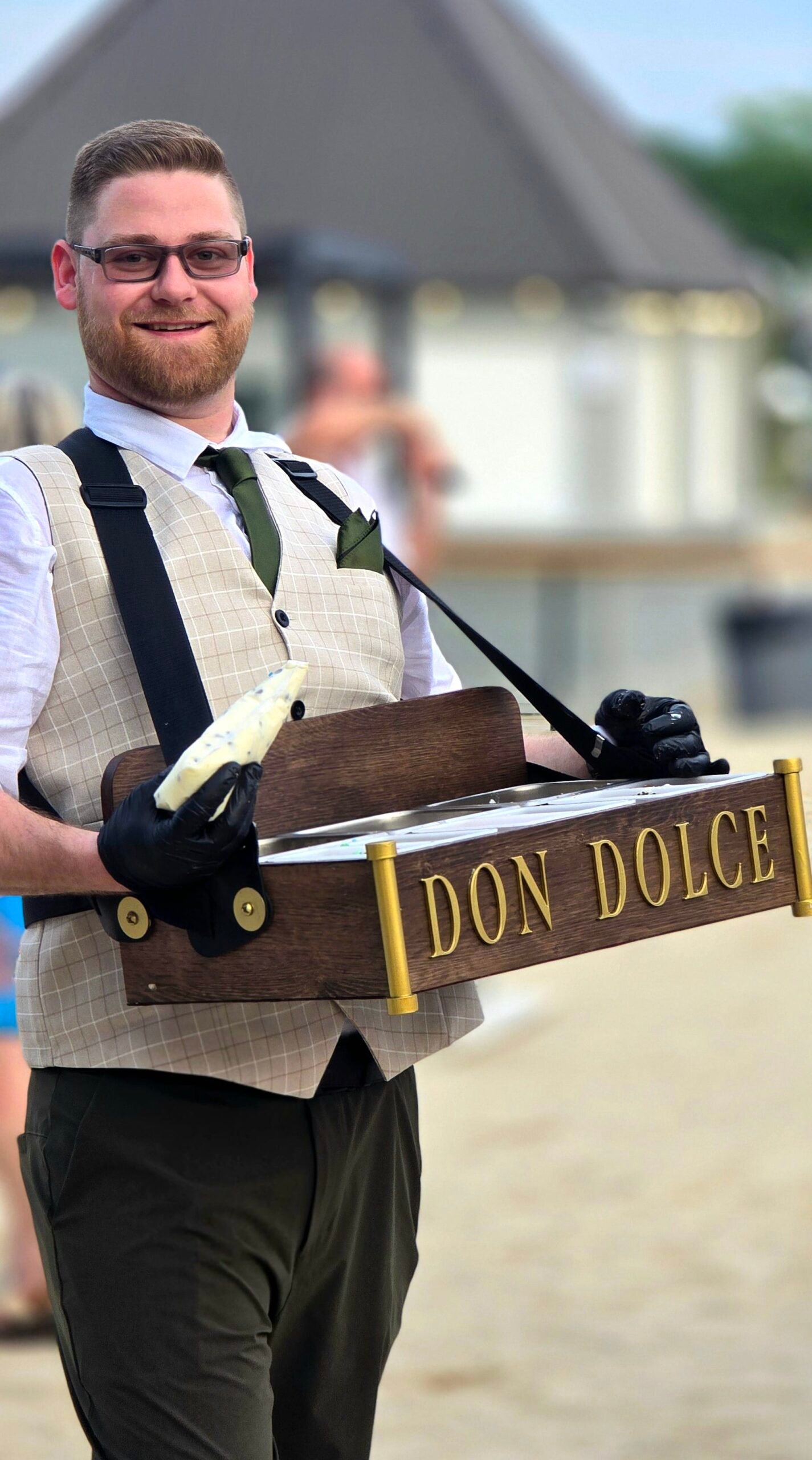 The Dolces with a cannoli piping bag and roaming serving caddy at Fairlee Creek in Chestertown, Maryland.